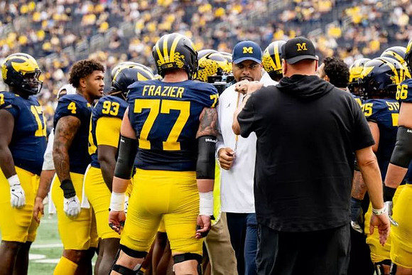 Grant Newsome and Michigan Team