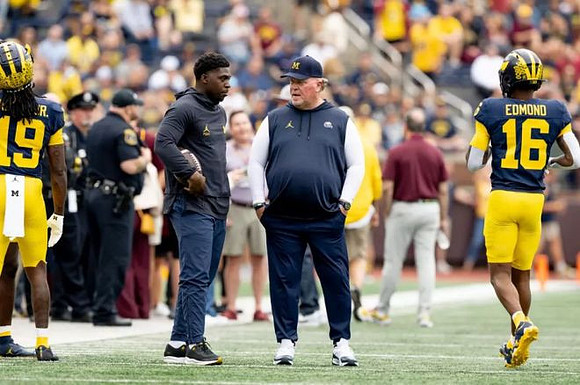 Wink Martindale, Jo'Ziah Edmond (16), and Rod Moore (19)