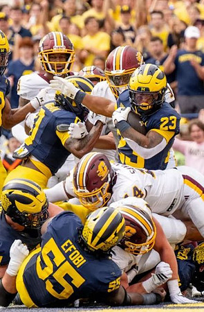 Semaj Morgan (0), Jordan Marshall (23), and Nathan Efobi (55)