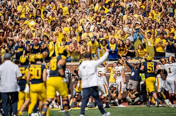 Greg Crippen (51) and Michigan Team