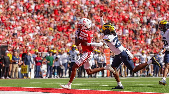 Jyaire Hill (20) and Brandyn Hillman (6)