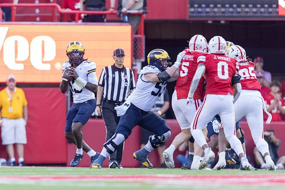 Bryce Underwood (19) and Jake Guarnera (53)