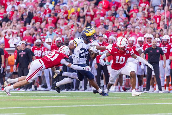 Justice Haynes (22) and Nebraska Head Coach Matt Rhule