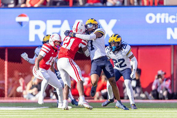 TJ Metcalf (7) and Elijah Dotson (22)