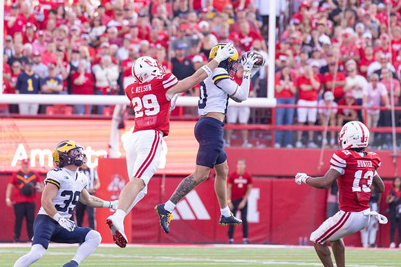 Joe Taylor (39) and Semaj Morgan (0)
