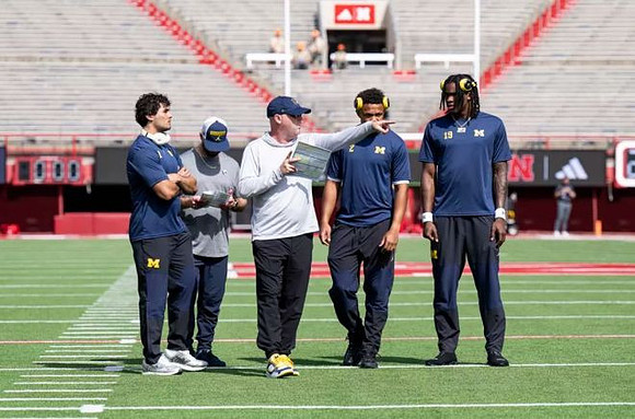 Bryce Underwood (19) and Michigan Team