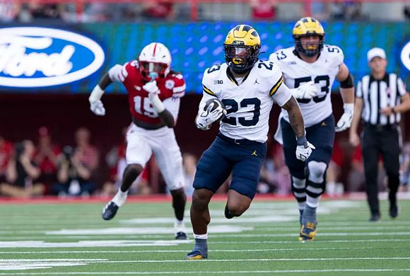 Jordan Marshall (23) and Jake Guarnera (53)