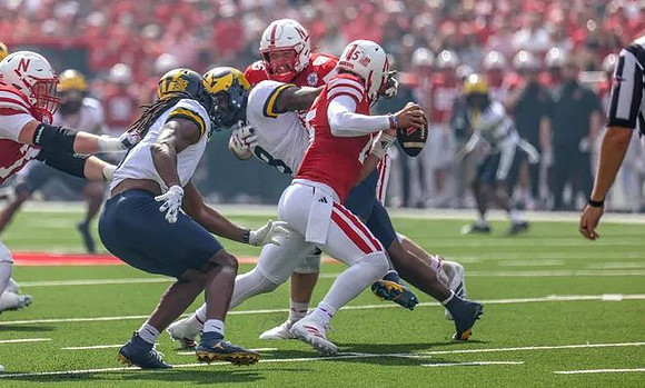 Jaishawn Barham (1) and Derrick Moore (8)