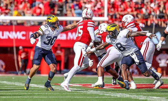 Jimmy Rolder (30) and Derrick Moore (8)
