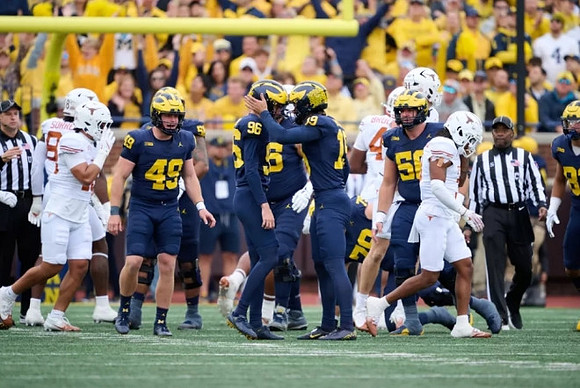 William Wagner (49), Dominic Zvada (96), Tommy Doman (19), and Michigan Team