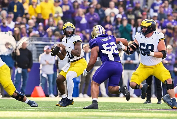 Alex Orji (10) and Josh Priebe (68)