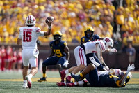 Ernest Hausmann (15), Derrick Moore (8), and Damon Payne (44)