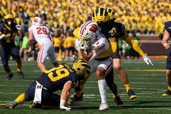 Joe Taylor (39), Elijah Dotson (22), and Damon Payne (44)
