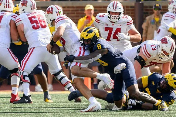 Derrick Moore (8) and Rayshaun Benny (26)