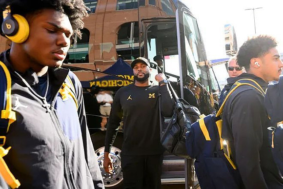 Sherrone Moore and Michigan Team