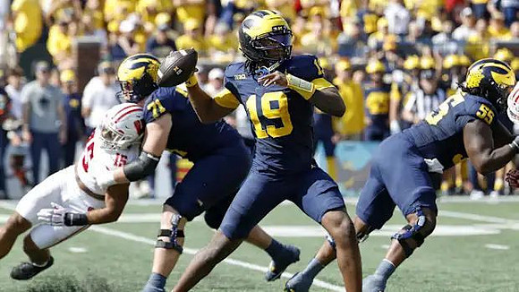 Evan Link (71), Bryce Underwood (19), and Nathan Efobi (55)