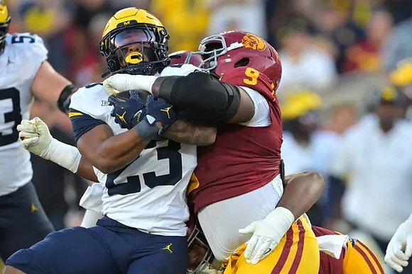 Jake Guarnera (53) and Jordan Marshall (23)