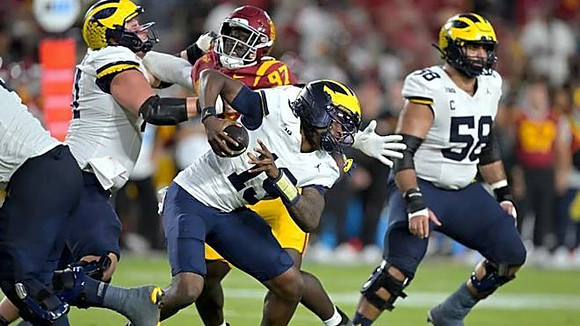 Bryce Underwood (19) and Giovanni El-Hadi (58)