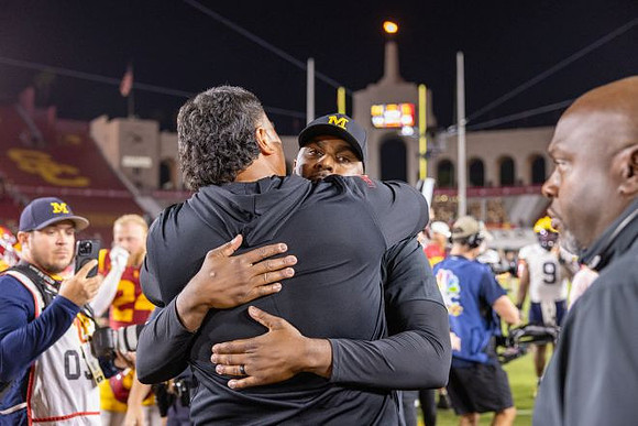 Sherrone Moore and Tony Alford