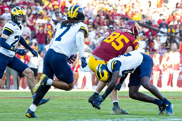 Mason Curtis (25) and TJ Metcalf (7)