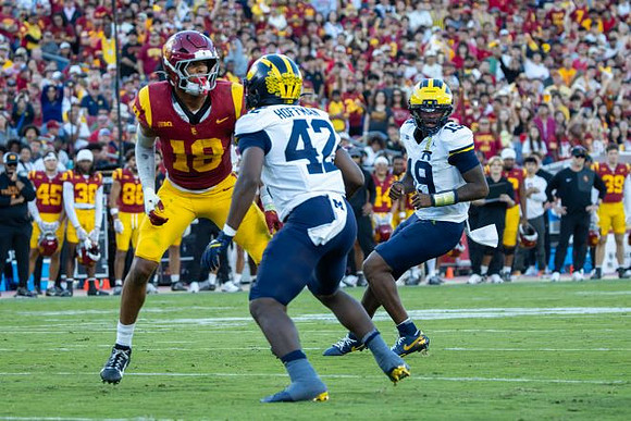 Jalen Hoffman (42) and Bryce Underwood (19)