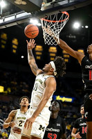 Roddy Gayle Jr. (11) and Yaxel Lendeborg (23)
