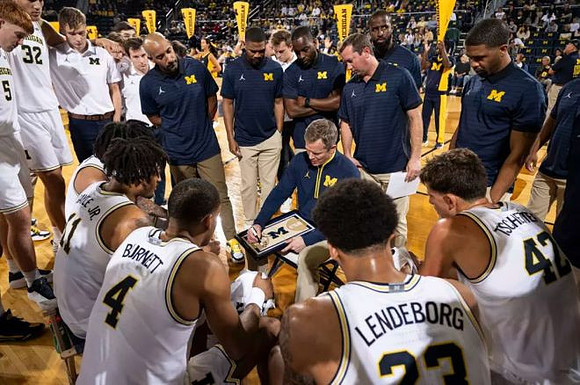Dusty May and Michigan Team