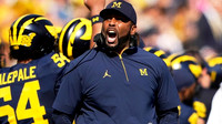 Sherrone Moore and Deyvid Palepale (54)