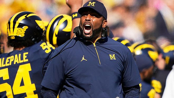 Sherrone Moore and Deyvid Palepale (54)