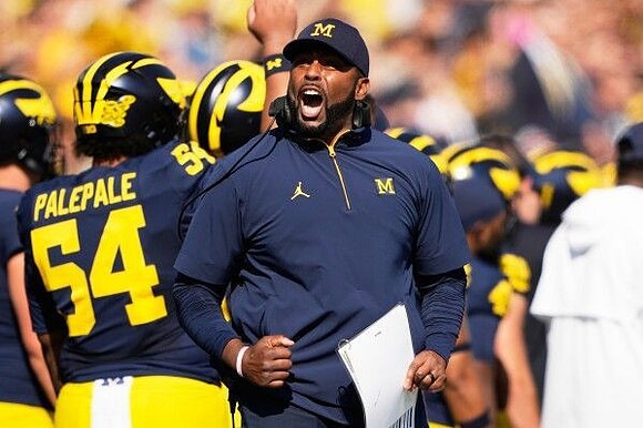 Sherrone Moore and Deyvid Palepale (54)