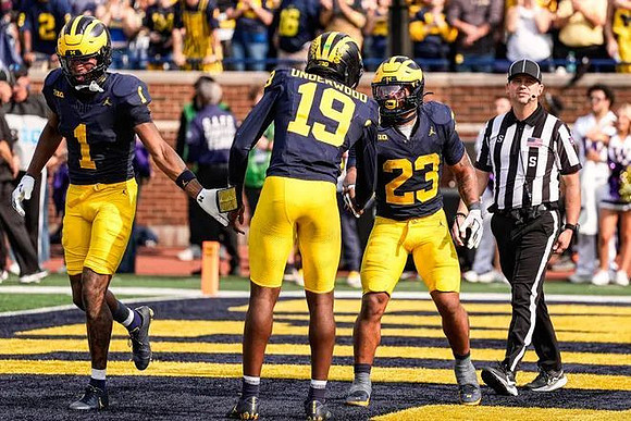 Donaven McCulley (1), Bryce Underwood (19), and Jordan Marshall (23)