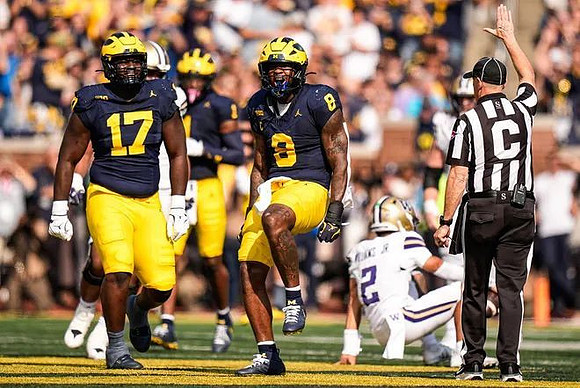 Enow Etta (17), Jaishawn Barham (1), and Derrick Moore (8)