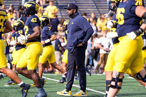 Sherrone Moore and Michigan Team