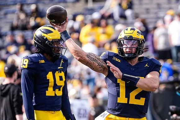 Bryce Underwood (19) and Jake Garcia (12)