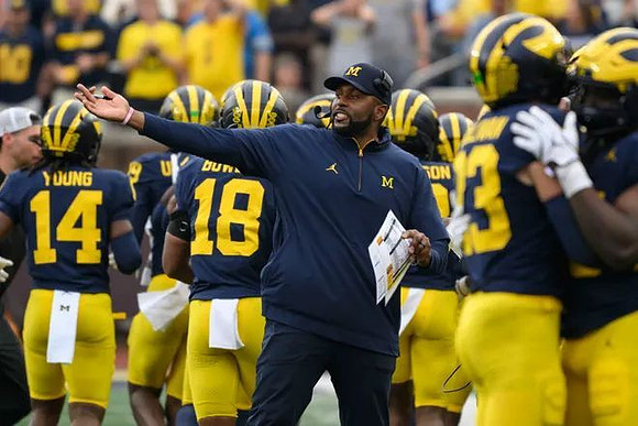 Sherrone Moore and Michigan Team