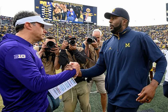 Washington Head Coach Jedd Fisch  and Sherrone Moore