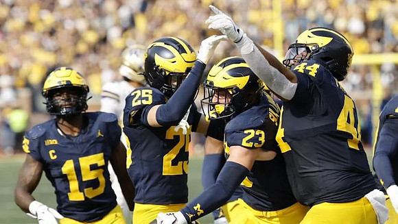 Ernest Hausmann (15), Mason Curtis (25), Cole Sullivan (23), and Damon Payne (44)