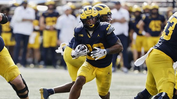 Jordan Marshall (23) and Jake Guarnera (53)