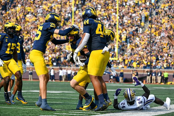 Ernest Hausmann (15), Mason Curtis (25), Cole Sullivan (23), Damon Payne (44), and Zeke Berry (10)