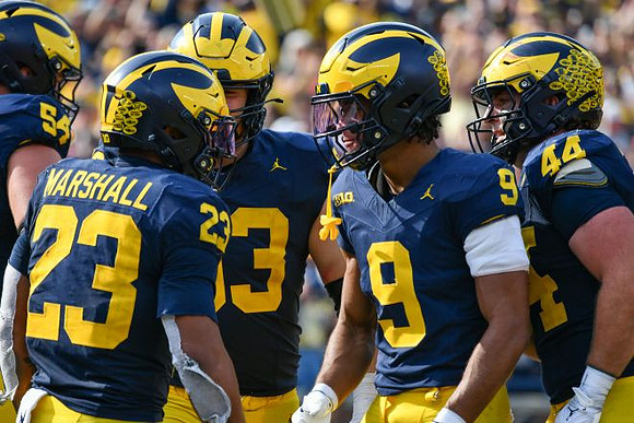 Andrew Sprague (54), Jordan Marshall (23), Jake Guarnera (53), Channing Goodwin (9), and Max Bredeson (44)