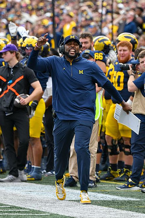 Sherrone Moore and Michigan Team