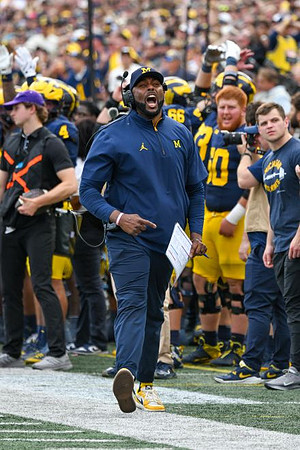 Sherrone Moore and Michigan Team