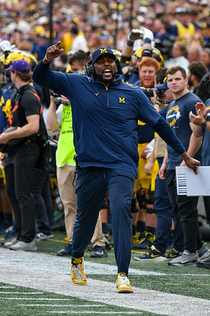 Sherrone Moore and Michigan Team