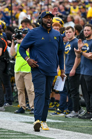 Sherrone Moore and Michigan Team