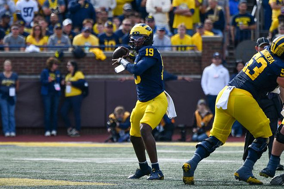 Bryce Underwood (19) and Jake Guarnera (53)