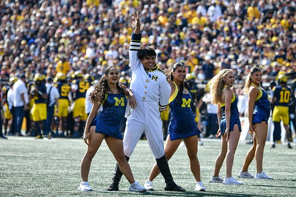 Michigan Drum Major and Michigan Cheerleaders