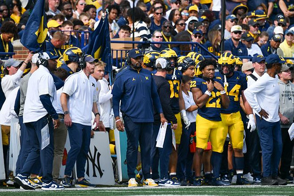 Sherrone Moore and Michigan Team