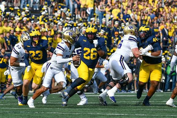 Cole Sullivan (23), Rayshaun Benny (26), and Damon Payne (44)