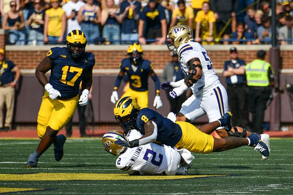 Enow Etta (17), Jaden Mangham (3), and Derrick Moore (8)