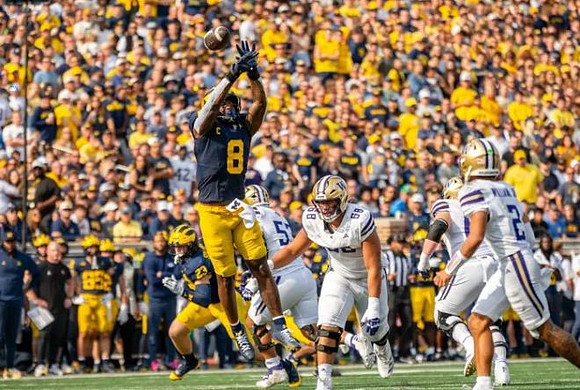 Cole Sullivan (23) and Derrick Moore (8)